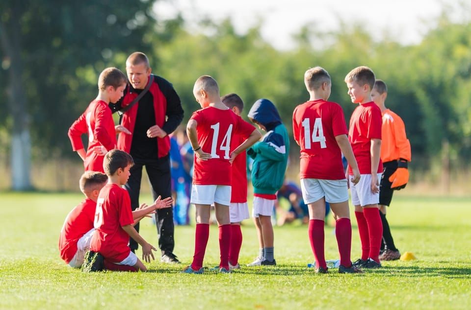 David T. Schlendorf coaching youth football in America